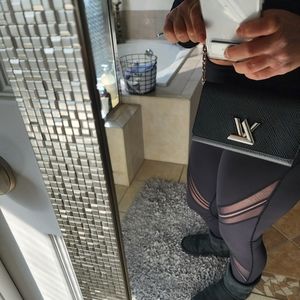 Authentic Purse it is smaller size very pretty almost new I worn couple time